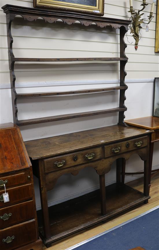 An 18th century style oak dresser W.104cm